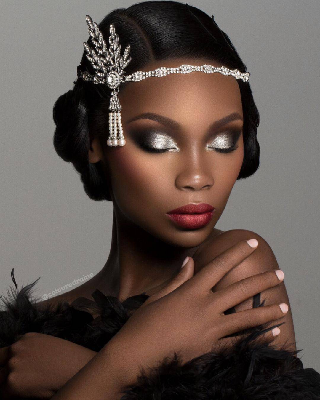 Cheers To The Beauty™ eyeshadow and highlighter palette worn on a dark-skinned model with head dress