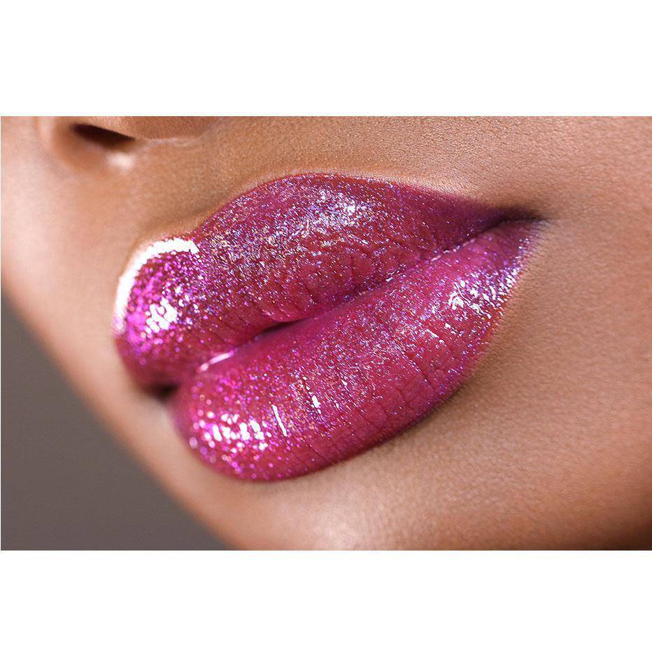 This high shine purple lip gloss features a flat sponge-tip applicator - Prom Night Lip Gloss by Coloured Raine Cosmetics