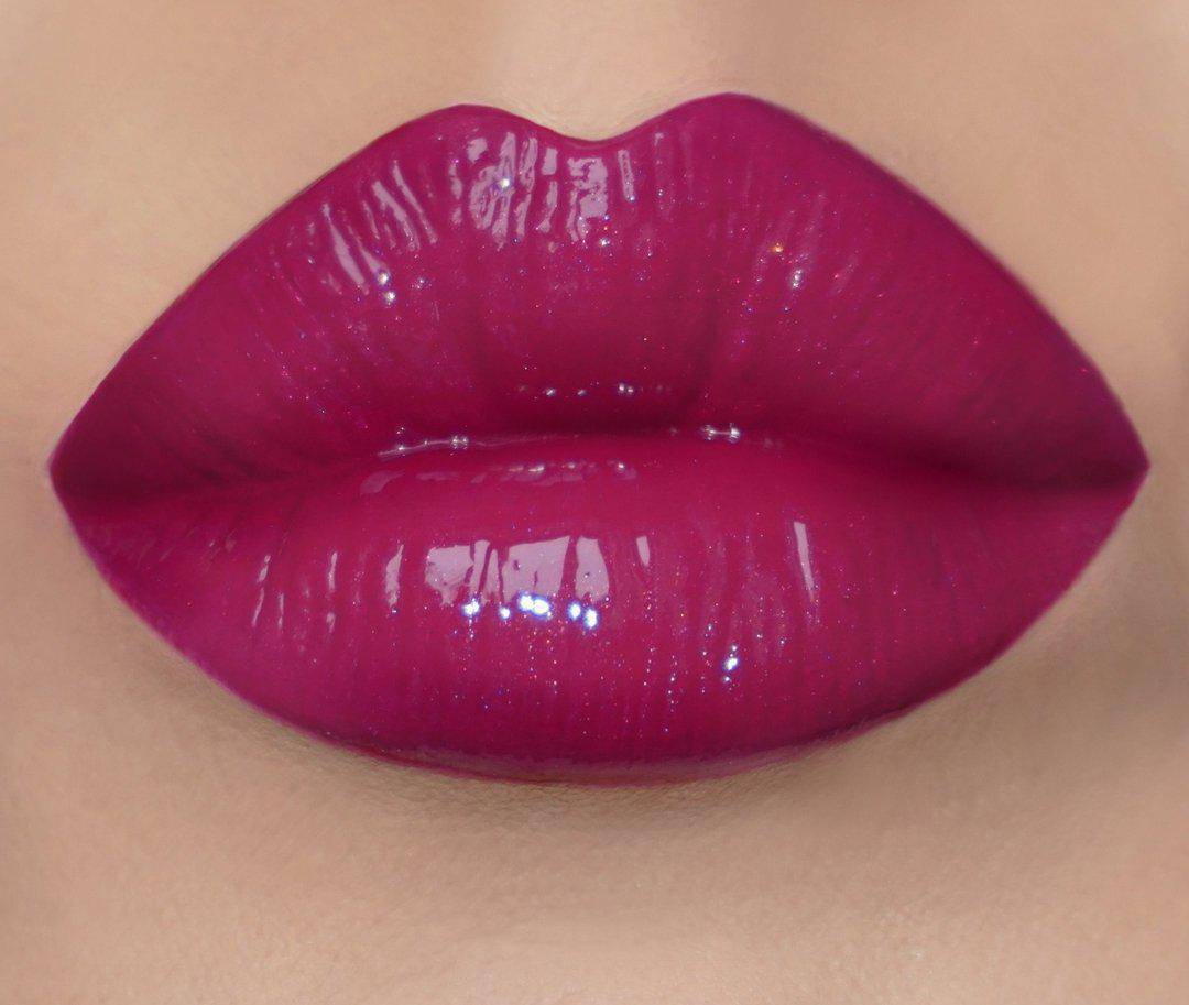 Non-sticky, and super pigmented deep pink lip lacquer - XoXo by Coloured Raine Cosmetics