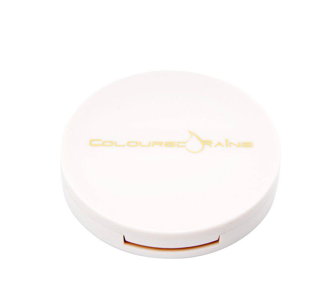Your Treat - Golden bronze highlighter by Coloured Raine Cosmetics. Closed, in a white container with gold Coloured Raine logo.